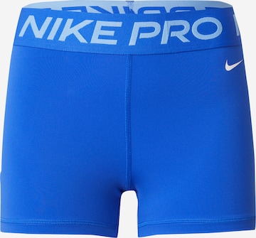 Skinny Pantalon de sport NIKE en bleu : devant