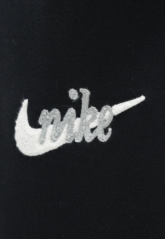 melns Nike Sportswear Platas staras Bikses 'PHNX FLC'