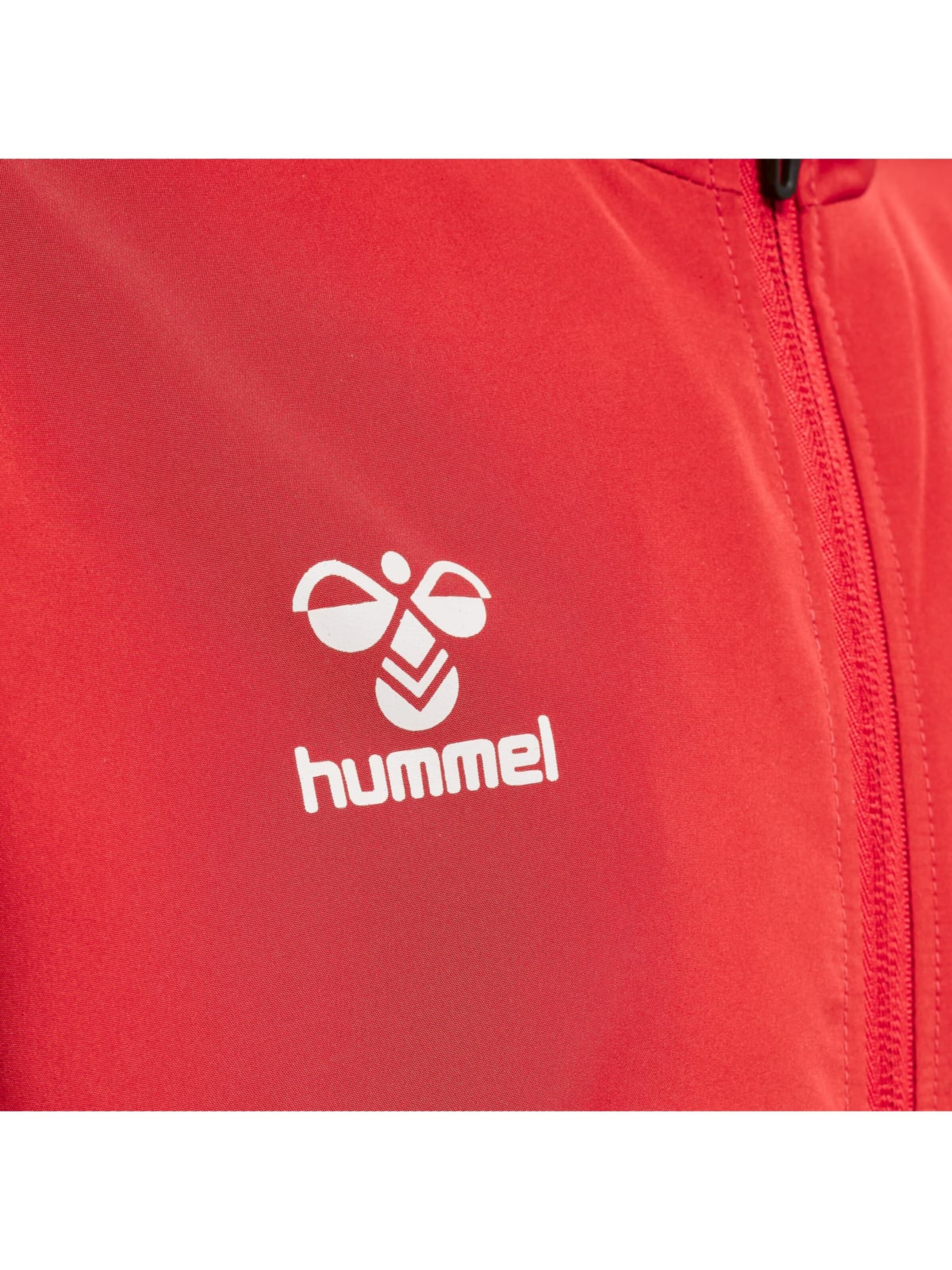 Veste de sport 'hmlCORE XK MICRO ZIP JACKET KIDS' Hummel en rouge