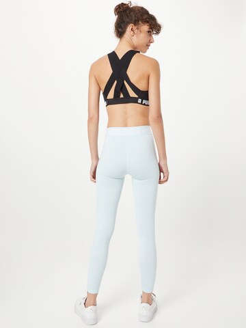 PUMA Skinny Workout Pants in Blue