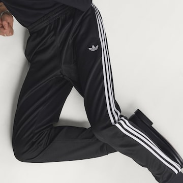 ADIDAS ORIGINALS Дънки Tapered Leg Панталон 'SST' в черно