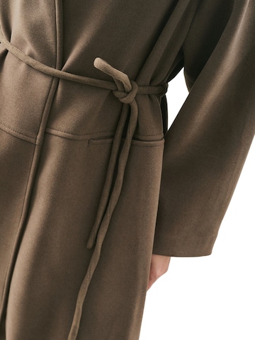 MANUKA Between-seasons coat in Green