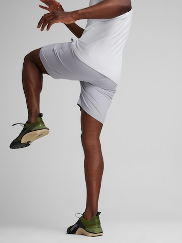 PUMA Štandardný strih Športové nohavice 'Concept 8' - Sivá