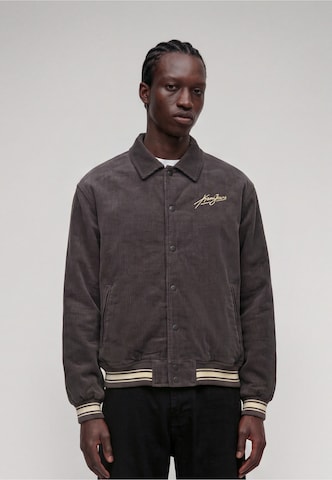 Karl Kani Between-season jacket in Brown: front
