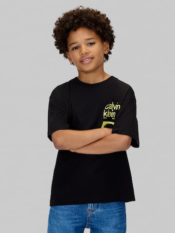 Calvin Klein Jeans Póló 'CITY SCENE' - fekete: elől
