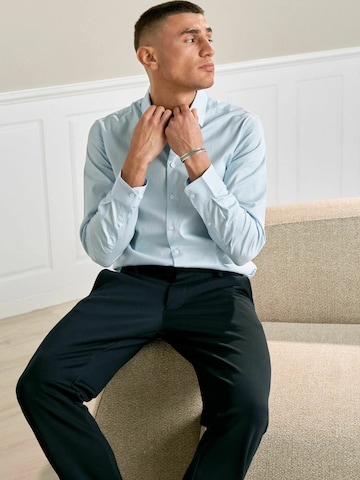 Coupe regular Chemise ' The Original ' TEESHOPPEN en bleu