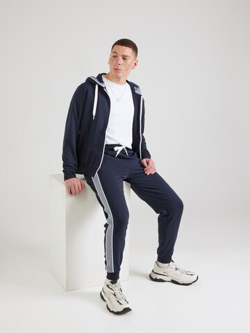 Tuta da jogging di EA7 Emporio Armani in blu