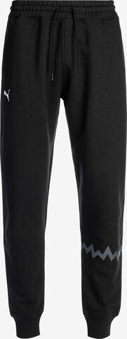 Loosefit Pantalon de sport PUMA en noir : devant