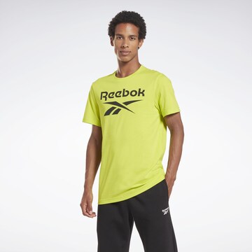 Reebok Функционална тениска в жълто: отпред