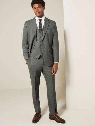Coupe slim Pantalon chino 'Motion Flex' Next en vert