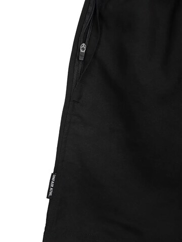 Pantaloncini da bagno 'Water Effect' di Unfair Athletics in nero