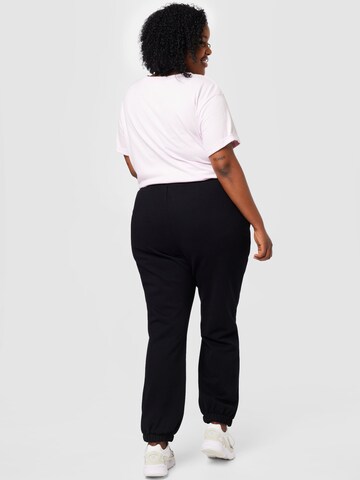 Calvin Klein Jeans Curve Tapered Hose in Schwarz