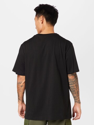 PUMA Funkcionalna majica 'RKDO' | črna barva
