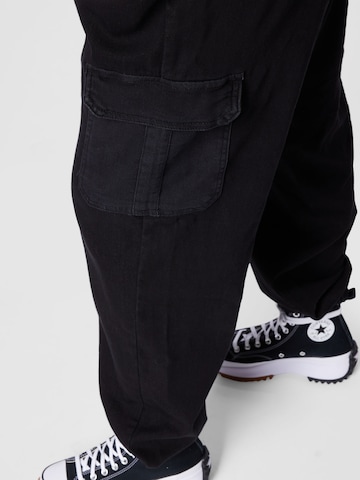 Urban Classics Tapered Cargo Pants in Black