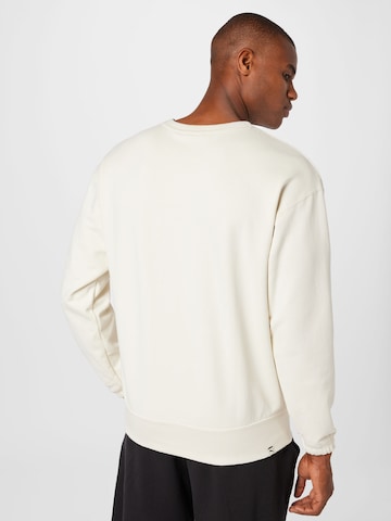 PUMA Athletic Sweatshirt 'PUMAxABOUT YOU' in Beige