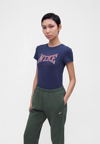 Tapered Pantaloni de la Nike Sportswear pe verde