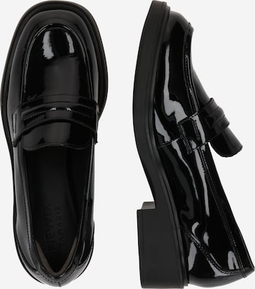 NEWD.Tamaris Slip-ons in Black