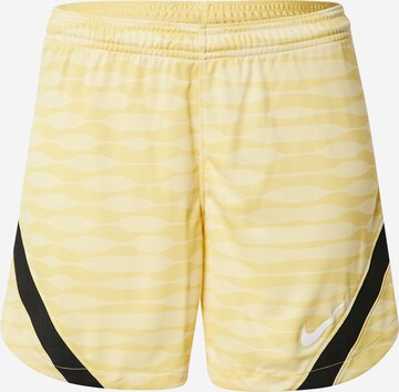 NIKE Workout Pants in Yellow: front