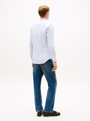 Coupe regular Chemise 'FLEX' TOMMY HILFIGER en bleu : derrière