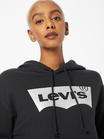 LEVI'S ® Collegepaita 'Graphic Standard Hoodie' värissä musta