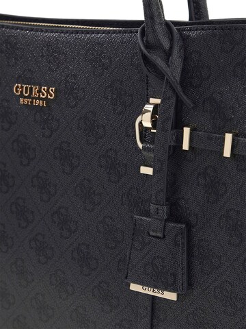 GUESS Schultertasche 'Leona'‌‌‌‌‌ in Schwarz