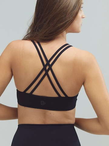 DRILLS Apparel Bralette Sports bra 'ACTIVE X-Strap Bra' in Black