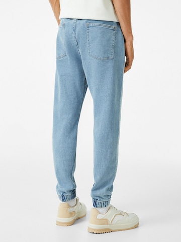 Bershka Tapered Jeans in Blue