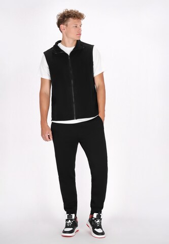 Mo ATHLSR - Chaleco en negro: frente