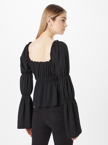 Top 'Majliz' di Gina Tricot in nero