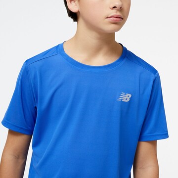new balance - Camiseta funcional 'Accelerate' en azul