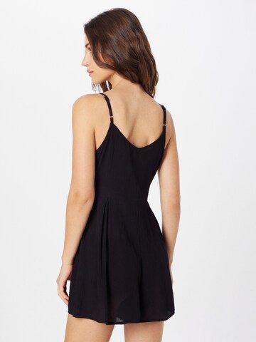 Tuta jumpsuit 'Mara' di ABOUT YOU in nero