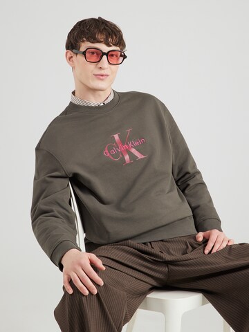 Calvin Klein Jeans Sweatshirt in Groen: voorkant