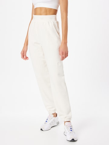 Tapered Pantaloni di ADIDAS ORIGINALS in bianco: frontale