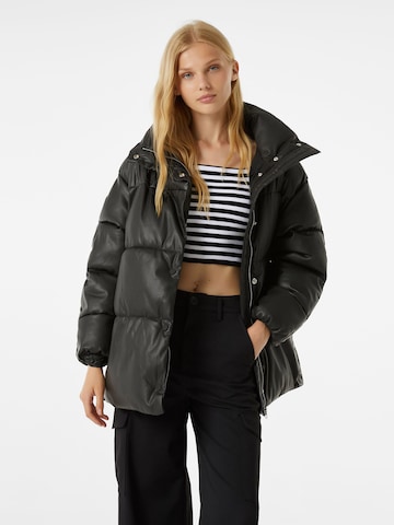 Bershka Winter Jacket in Black: front