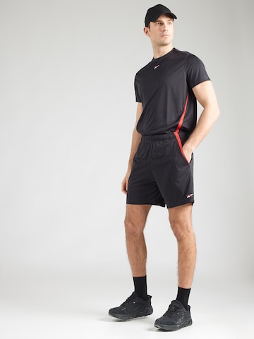 Reebok Štandardný strih Športové nohavice - Čierna