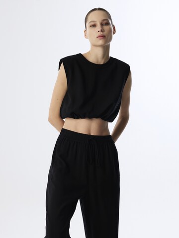 Twist Top in Zwart: voorkant