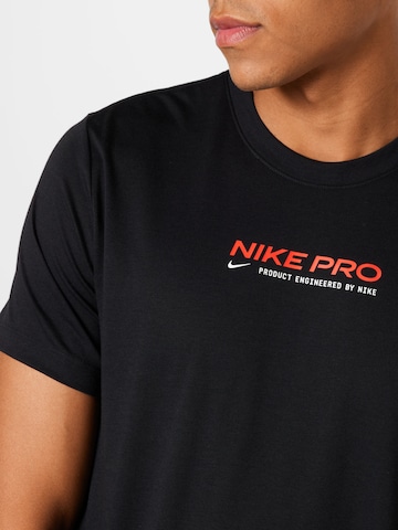 NIKE Funkční tričko – černá