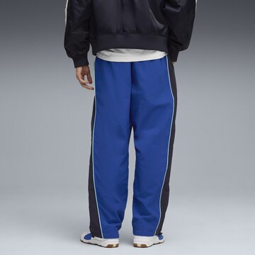 PUMA Loosefit Sportbroek 'Olympique De Marseille FtblEssentials Cellerator' in Blauw