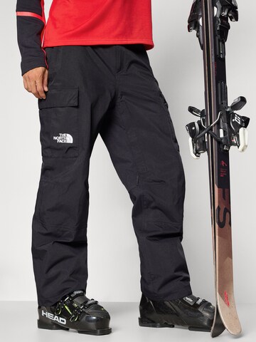 melns THE NORTH FACE Vaļīgs piegriezums Sporta bikses 'Blizzadery'