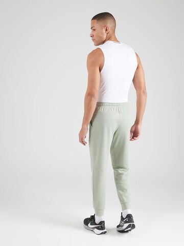 NIKE Конический (Tapered) Спортивные штаны 'PRIMARY' в Зеленый