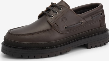 Travelin Slip-Ons in Brown: front