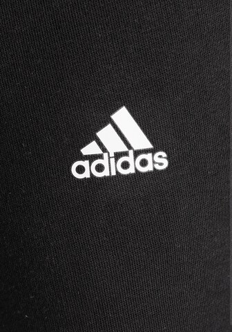 ADIDAS SPORTSWEAR Tapered Sports trousers 'Essentials Linear Logo' in Black