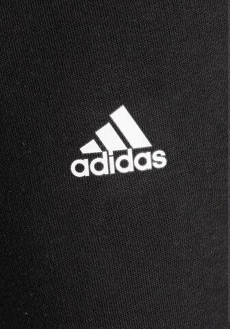 ADIDAS SPORTSWEAR Tapered Workout Pants 'Essentials Linear Logo' in Black