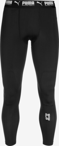 Skinny Pantalon de sport 'Hoops Team' PUMA en noir : devant