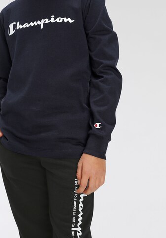 Champion Authentic Athletic Apparel Sweatshirt i blå