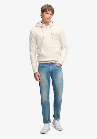 Superdry & Co Sweatshirt '1954 Company' in Beige