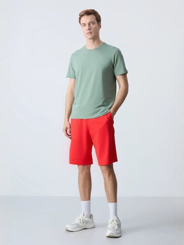 Regular Pantalon Tommy Life en rouge