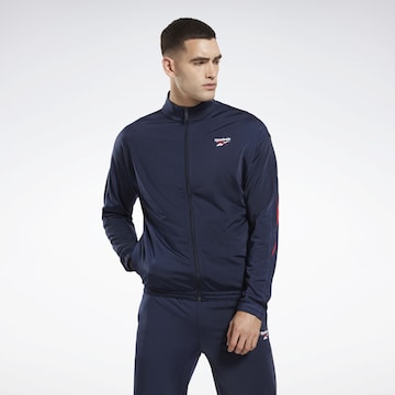 Reebok - Sudadera con cremallera deportiva en azul: frente