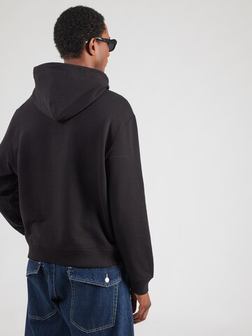 Felpa 'MONOGRAM' di Calvin Klein Jeans in nero: dietro