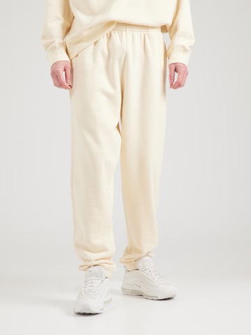 Regular Pantalon 'CLASSICS' Nike Sportswear en beige : devant